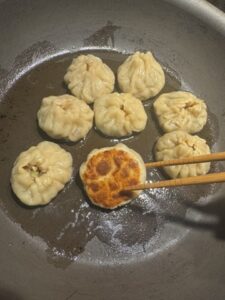 Image of momos being fried